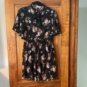 Inspired Hearts Black Dress with Floral Accents